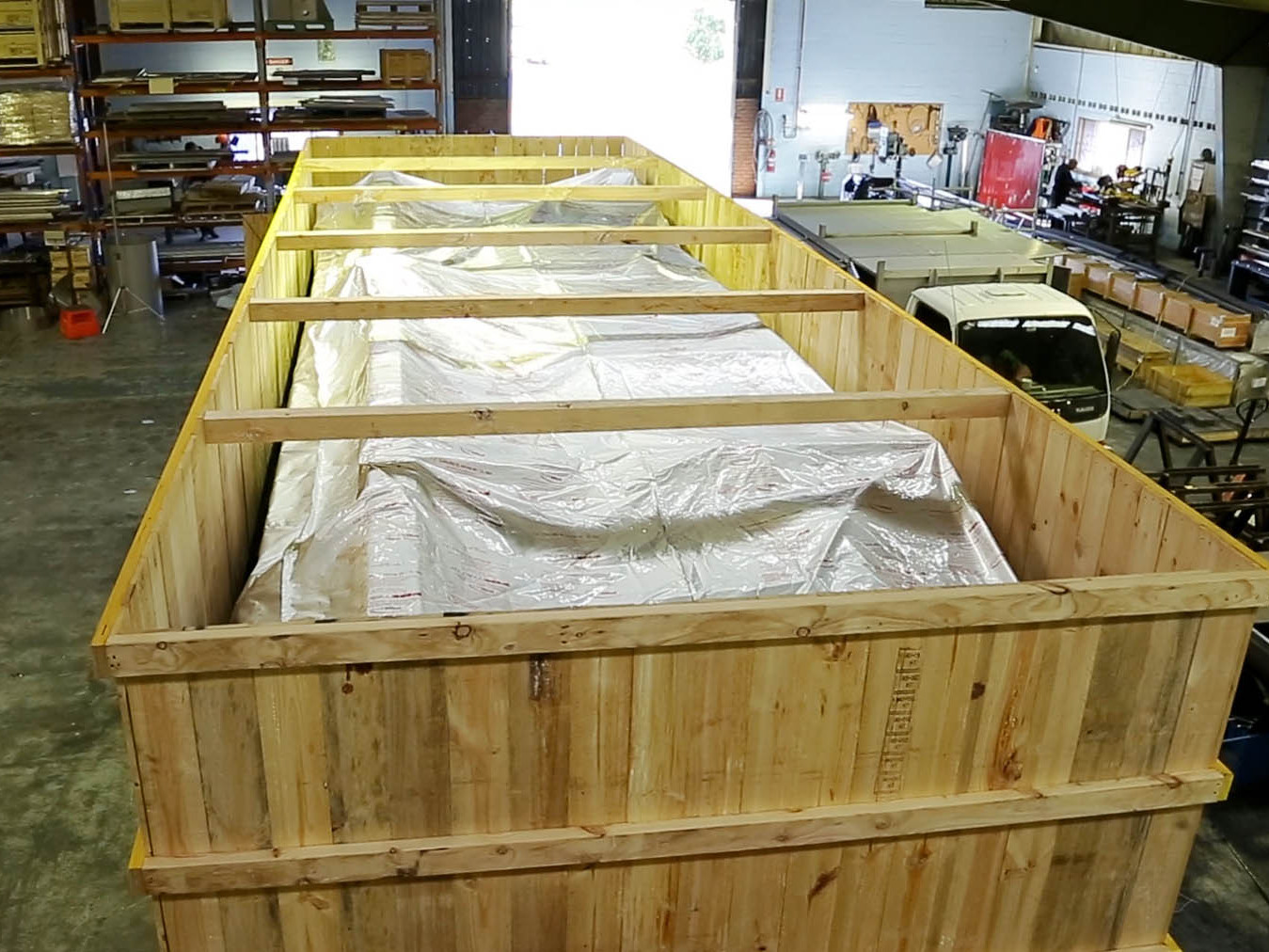 large wooden case with vci machinery