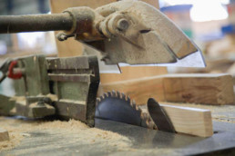 Machine sawing timber