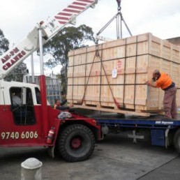 Transporting timber machinery containers in Sydney